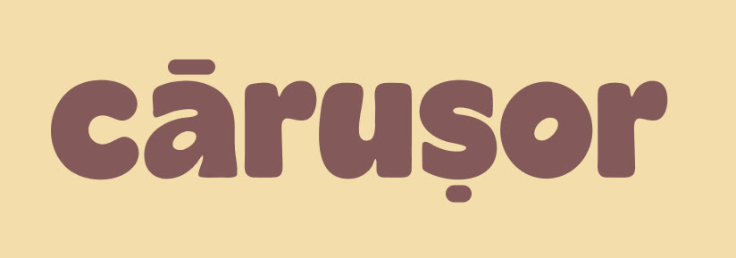 Wordmark-ul cărușor pe crem