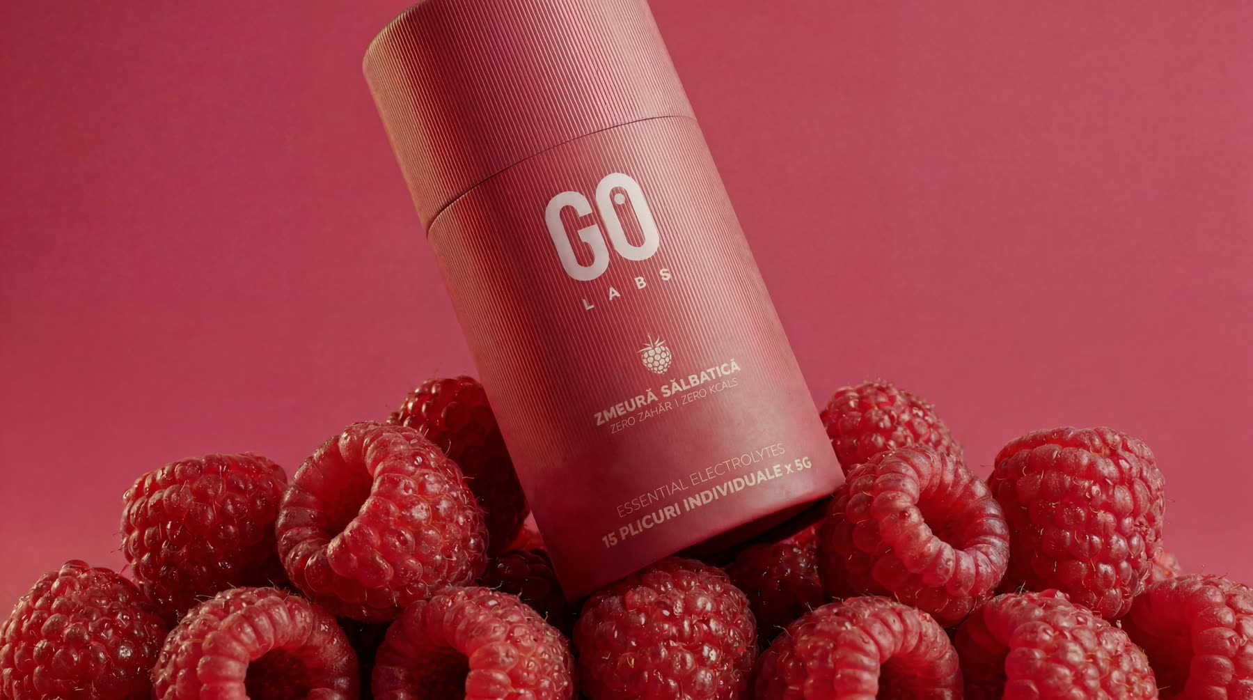The wild raspberry tube, on a mountain of raspberries